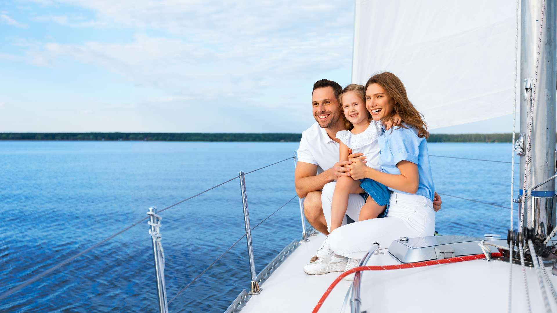 Happy kids and partner enjoying time on the Yacht